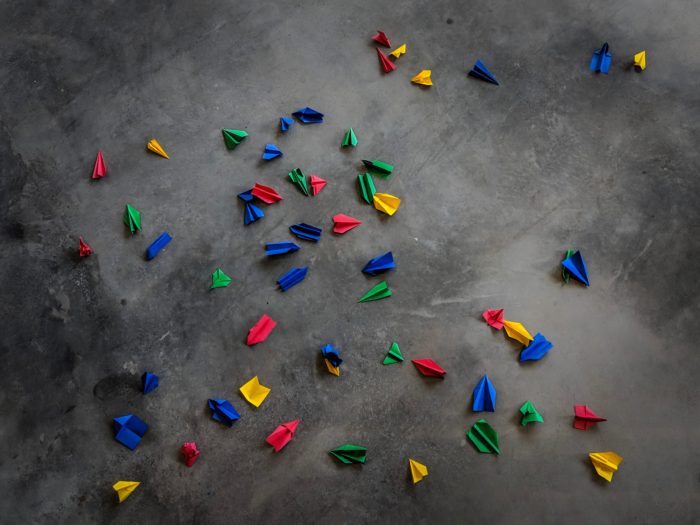 Photo: Origamis on concrete pavement by Reza Rostampisheh @ unsplash